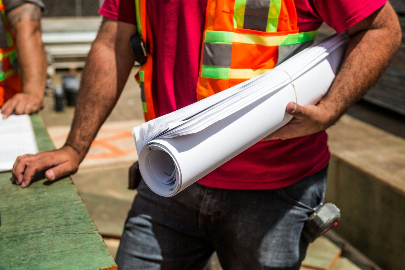 Rolled construction plan set ready for jobsite use.