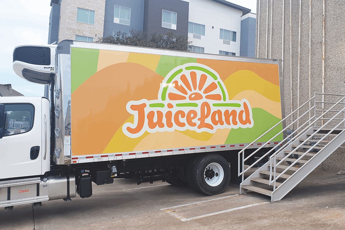 Juiceland branded truck graphics.