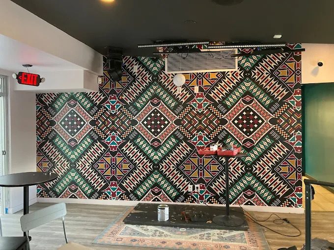 Patterned wall wrap installed inside an Austin venue.