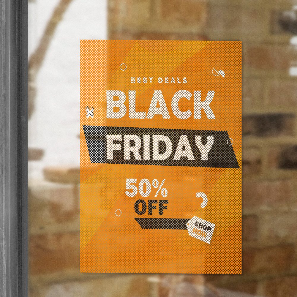 Perforated sale window graphic on retail glass.
